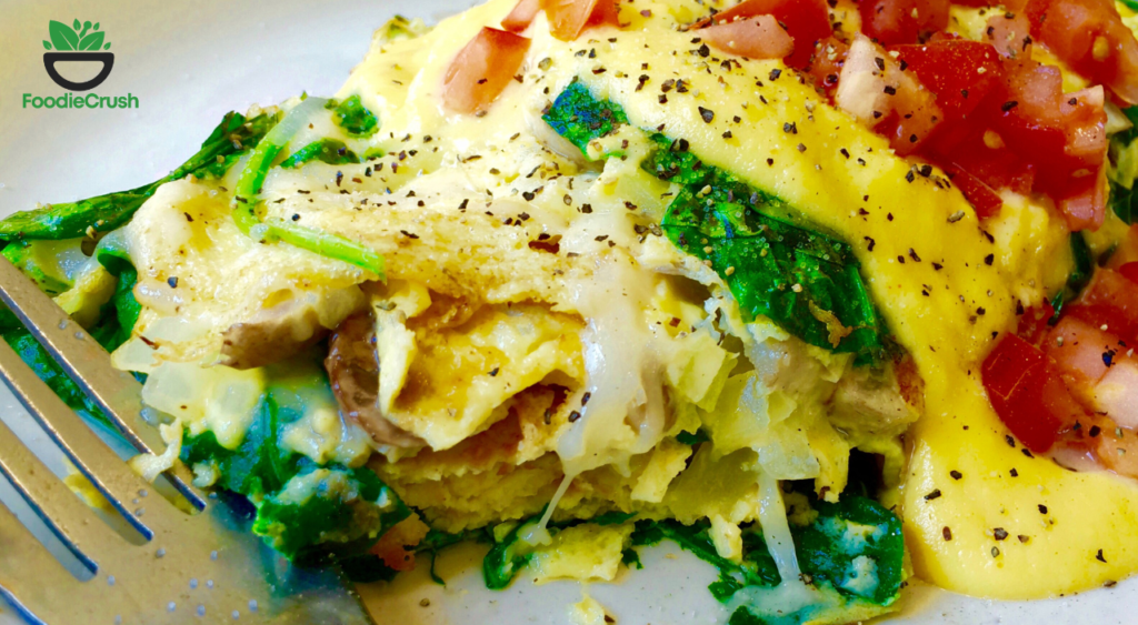 spinach omelet with feta eggs and canning tomato sauce 